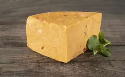 Mexicana är en prima engelsk Cheddar som är smaksatt med mexikanska…